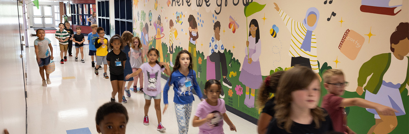 Students walking in the hall of Brubaker elementary